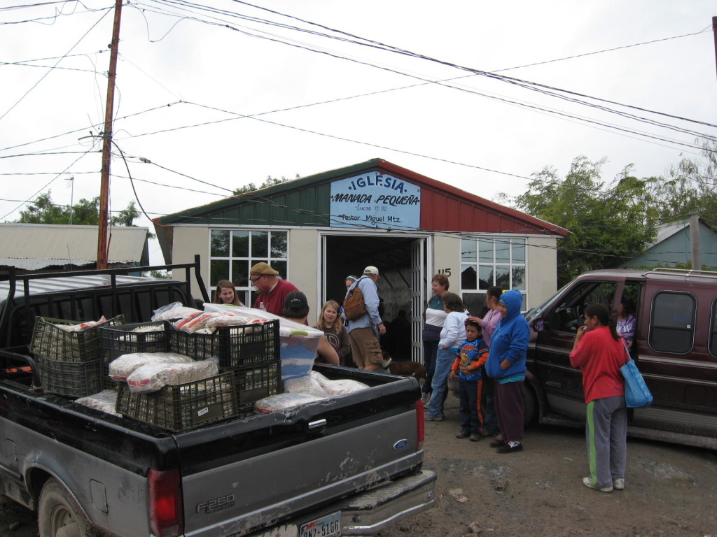 After the celebration we followed a truck loaded with rice and beans to the city dump to distribute food